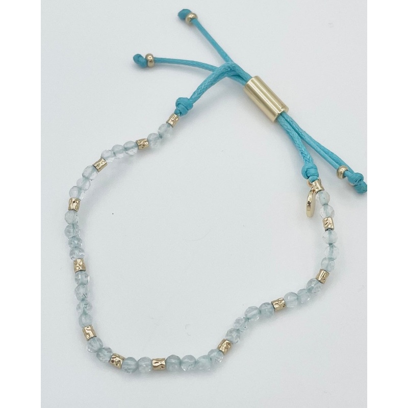 Blue String and Gold Bracelet